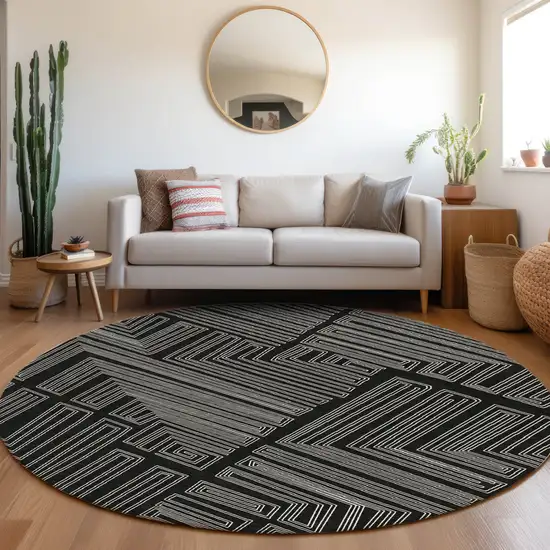8' Black And Ivory Round Geometric Washable Indoor Outdoor Area Rug Photo 8