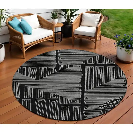 8' Black And Ivory Round Geometric Washable Indoor Outdoor Area Rug Photo 1