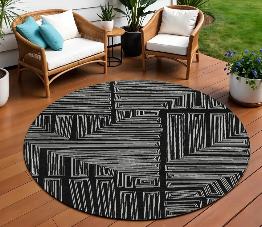 8' Black And Ivory Round Geometric Washable Indoor Outdoor Area Rug Photo 1