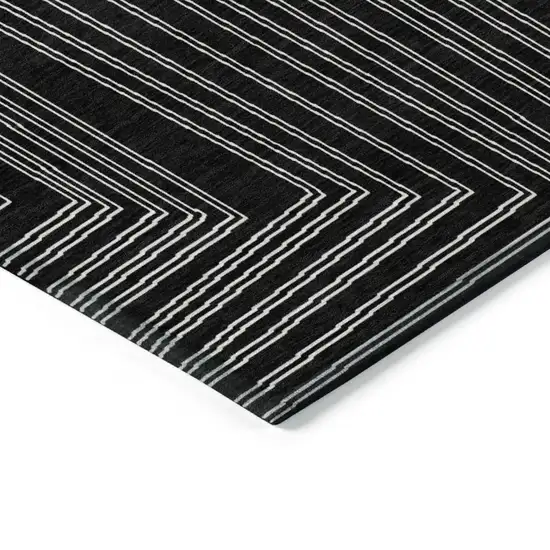 8' Black And Ivory Round Geometric Washable Indoor Outdoor Area Rug Photo 4