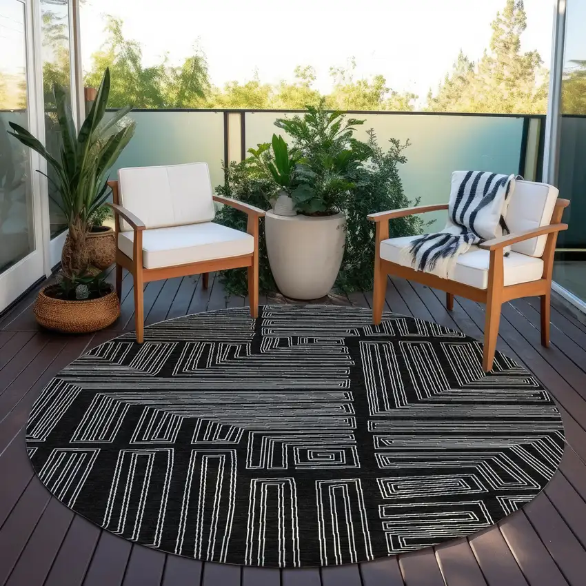 8' Black And Ivory Round Geometric Washable Indoor Outdoor Area Rug Photo 7