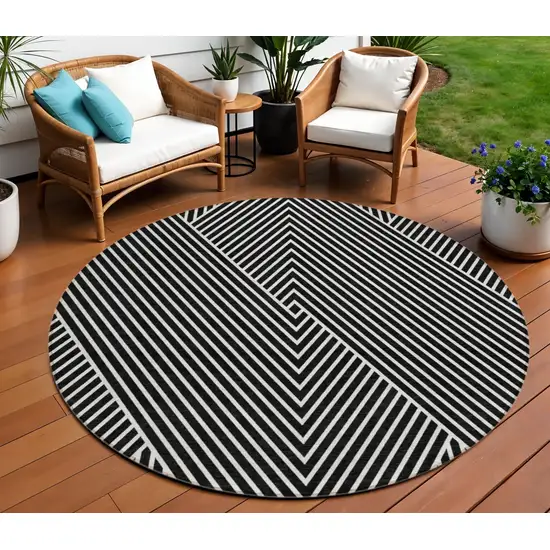 8' Black And Ivory Round Geometric Washable Indoor Outdoor Area Rug Photo 1