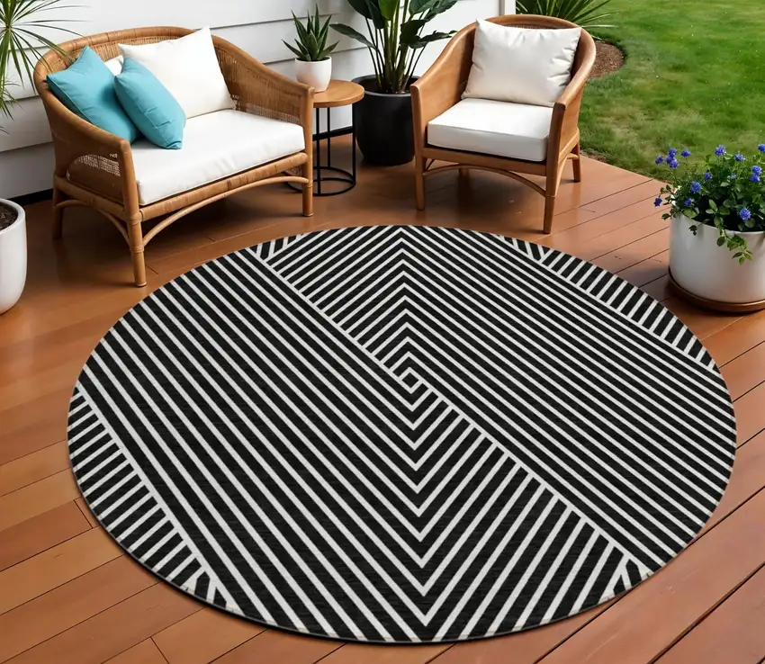 8' Black And Ivory Round Geometric Washable Indoor Outdoor Area Rug Photo 1