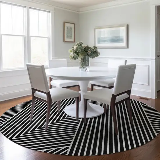 8' Black And Ivory Round Geometric Washable Indoor Outdoor Area Rug Photo 8