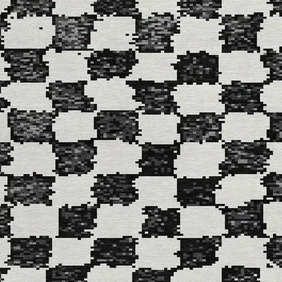 8' Black And Ivory Round Geometric Washable Indoor Outdoor Area Rug Photo 8