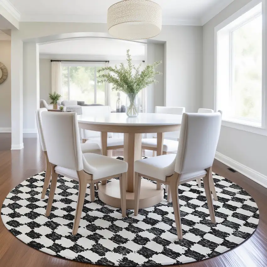 8' Black And Ivory Round Geometric Washable Indoor Outdoor Area Rug Photo 6