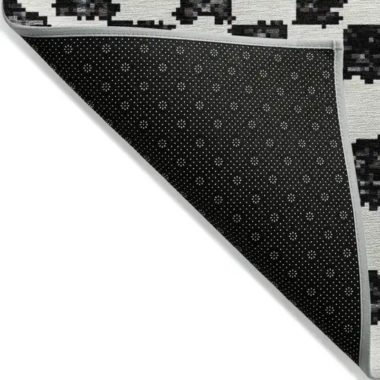 8' Black And Ivory Round Geometric Washable Indoor Outdoor Area Rug Photo 9