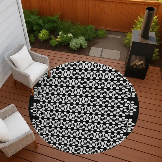 8' Black And Ivory Round Geometric Washable Indoor Outdoor Area Rug Photo 7