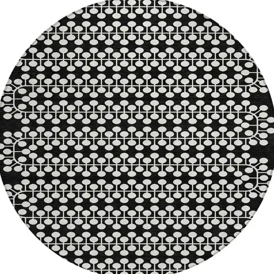 8' Black And Ivory Round Geometric Washable Indoor Outdoor Area Rug Photo 4