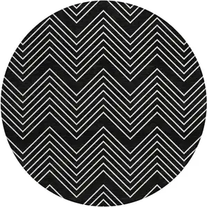 Photo of 8' Black And Ivory Round Geometric Washable Indoor Outdoor Area Rug