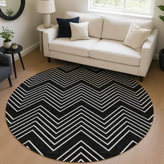 8' Black And Ivory Round Geometric Washable Indoor Outdoor Area Rug Photo 5