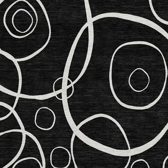 8' Black And Ivory Round Geometric Washable Indoor Outdoor Area Rug Photo 2