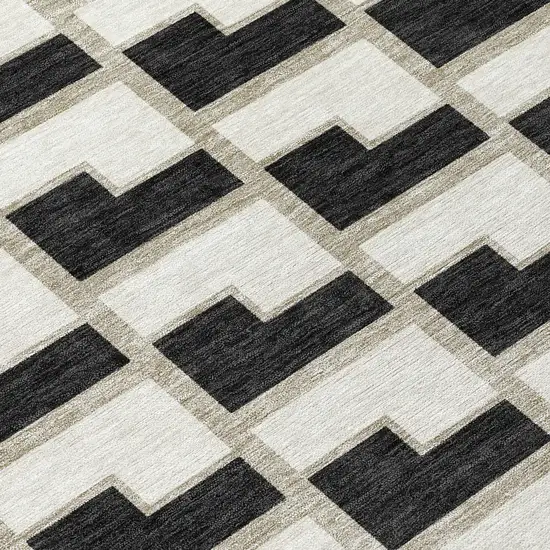 8' Black And Ivory Round Geometric Washable Indoor Outdoor Area Rug Photo 9