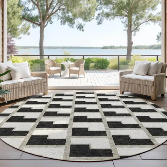 8' Black And Ivory Round Geometric Washable Indoor Outdoor Area Rug Photo 4