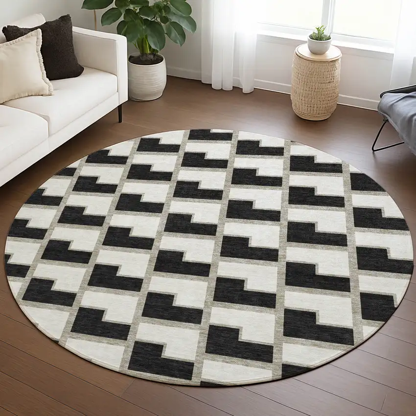 8' Black And Ivory Round Geometric Washable Indoor Outdoor Area Rug Photo 5