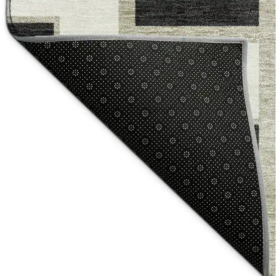 8' Black And Ivory Round Geometric Washable Indoor Outdoor Area Rug Photo 7