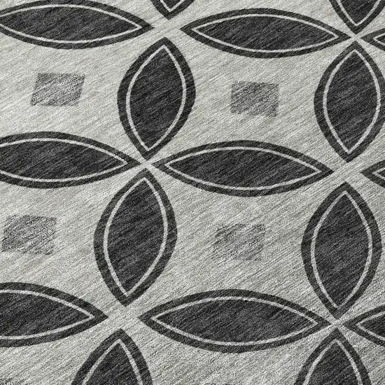 8' Black And Ivory Round Geometric Washable Indoor Outdoor Area Rug Photo 9