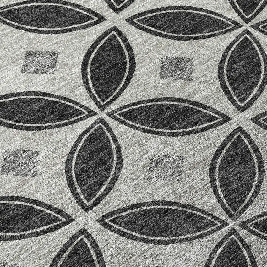 8' Black And Ivory Round Geometric Washable Indoor Outdoor Area Rug Photo 9