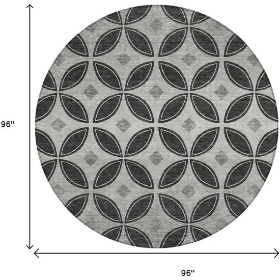 8' Black And Ivory Round Geometric Washable Indoor Outdoor Area Rug Photo 7
