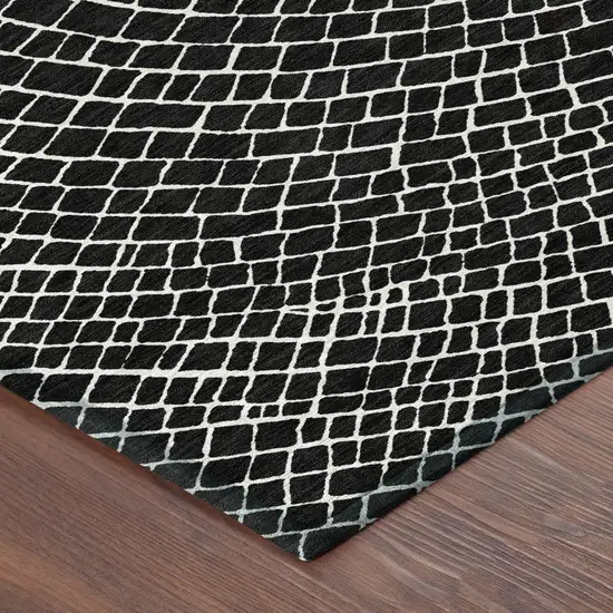 8' Black And Ivory Round Geometric Washable Indoor Outdoor Area Rug Photo 6