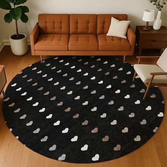 8' Black And Ivory Round Geometric Washable Indoor Outdoor Area Rug Photo 5