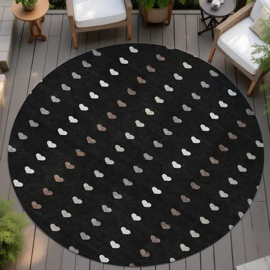 8' Black And Ivory Round Geometric Washable Indoor Outdoor Area Rug Photo 4