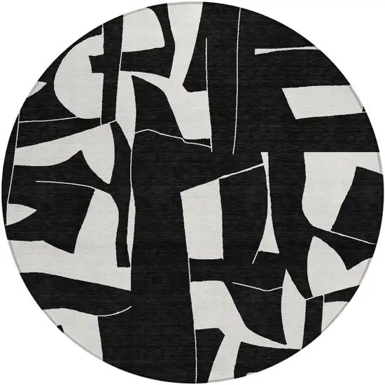 8' Black And Ivory Round Geometric Washable Indoor Outdoor Area Rug Photo 1