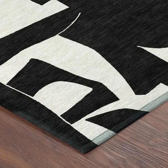 8' Black And Ivory Round Geometric Washable Indoor Outdoor Area Rug Photo 2