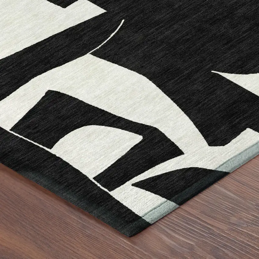 8' Black And Ivory Round Geometric Washable Indoor Outdoor Area Rug Photo 2