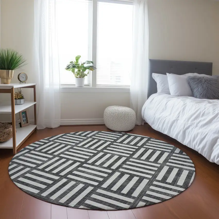 8' Black And Ivory Round Geometric Washable Indoor Outdoor Area Rug Photo 7