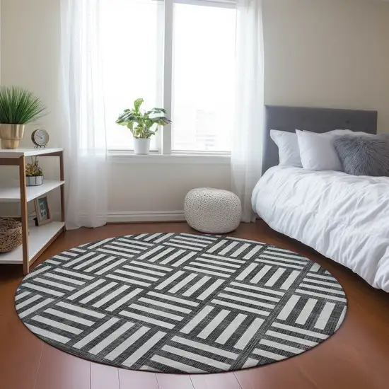8' Black And Ivory Round Geometric Washable Indoor Outdoor Area Rug Photo 7
