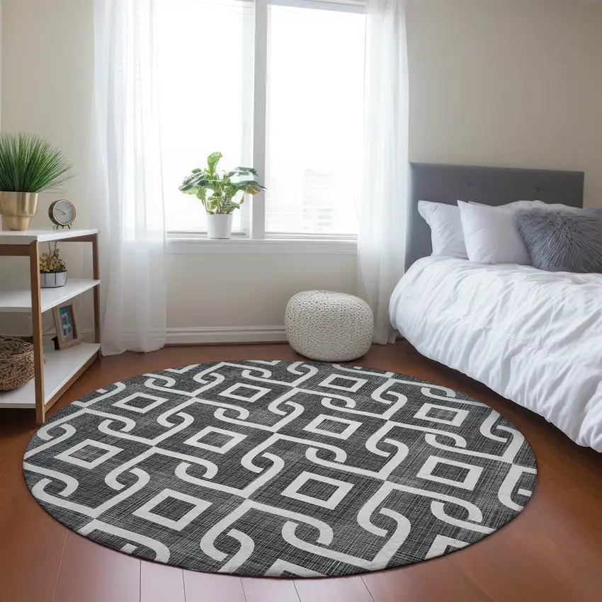 8' Black And Ivory Round Geometric Washable Indoor Outdoor Area Rug Photo 7