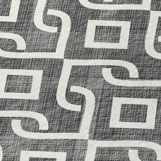 8' Black And Ivory Round Geometric Washable Indoor Outdoor Area Rug Photo 4