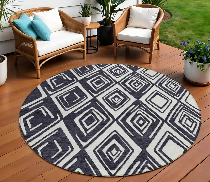 8' Black And Ivory Round Geometric Washable Indoor Outdoor Area Rug Photo 1