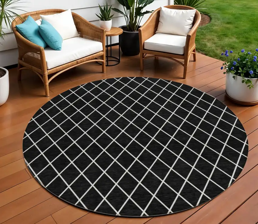 8' Black And Ivory Round Geometric Washable Indoor Outdoor Area Rug Photo 1
