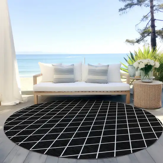 8' Black And Ivory Round Geometric Washable Indoor Outdoor Area Rug Photo 7