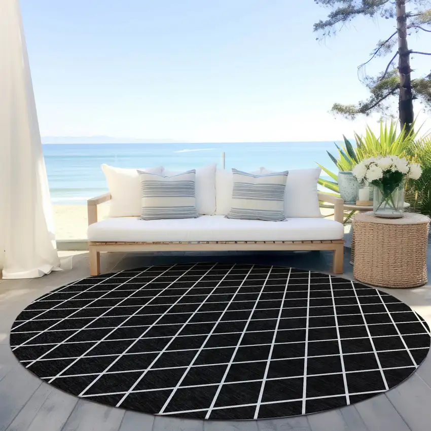 8' Black And Ivory Round Geometric Washable Indoor Outdoor Area Rug Photo 7