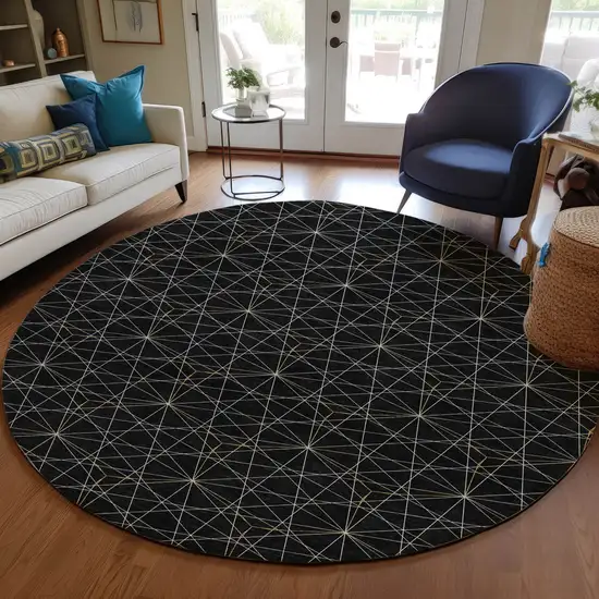 8' Black And Ivory Round Geometric Washable Indoor Outdoor Area Rug Photo 7