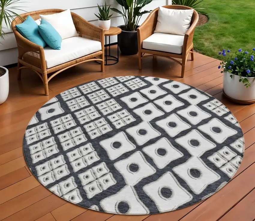 8' Black And Ivory Round Geometric Washable Indoor Outdoor Area Rug Photo 1