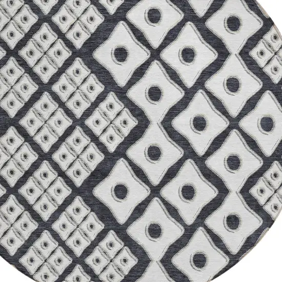 8' Black And Ivory Round Geometric Washable Indoor Outdoor Area Rug Photo 4