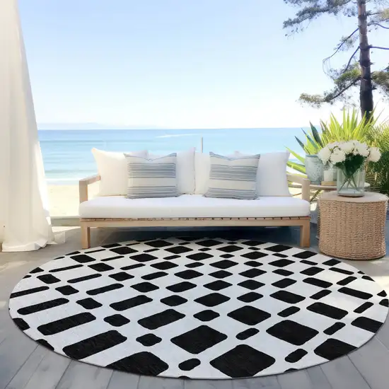 8' Black And Ivory Round Geometric Washable Indoor Outdoor Area Rug Photo 6