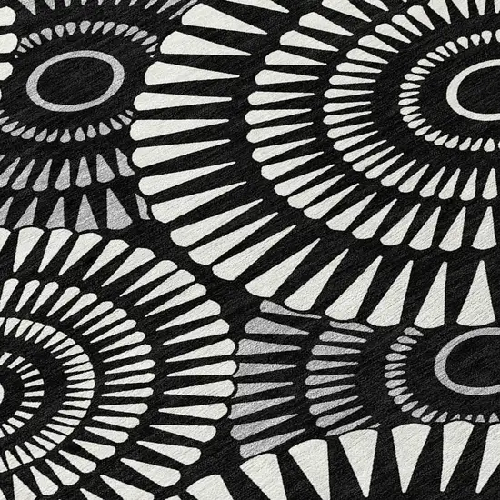 8' Black And Ivory Round Geometric Washable Indoor Outdoor Area Rug Photo 4