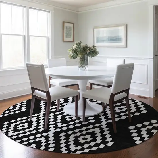 8' Black And Ivory Round Geometric Washable Indoor Outdoor Area Rug Photo 7