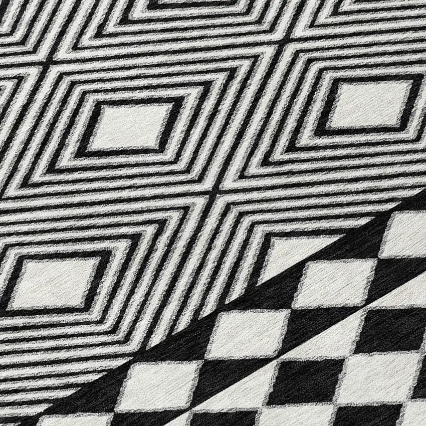 8' Black And Ivory Round Geometric Washable Indoor Outdoor Area Rug Photo 8