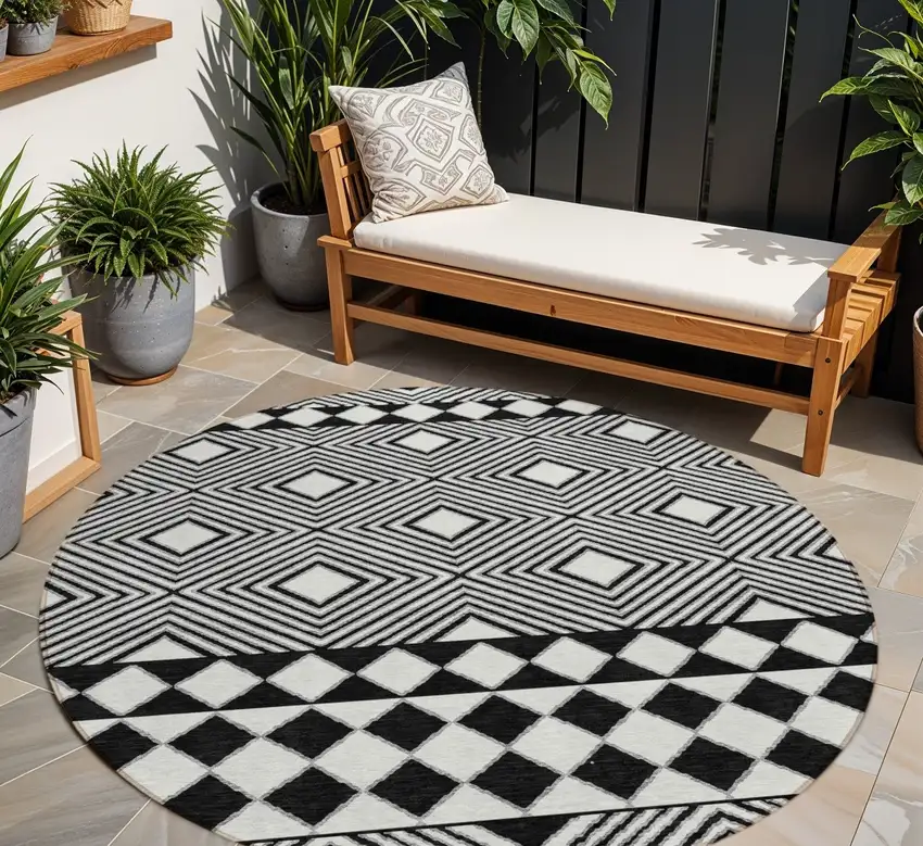 8' Black And Ivory Round Geometric Washable Indoor Outdoor Area Rug Photo 1