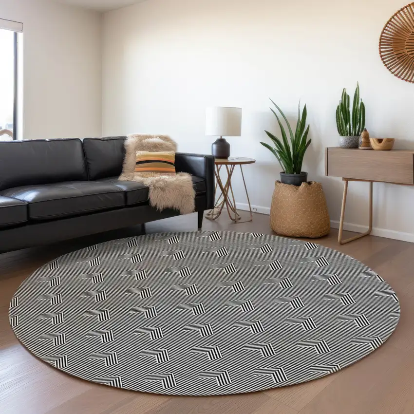 8' Black And Ivory Round Geometric Washable Indoor Outdoor Area Rug Photo 7