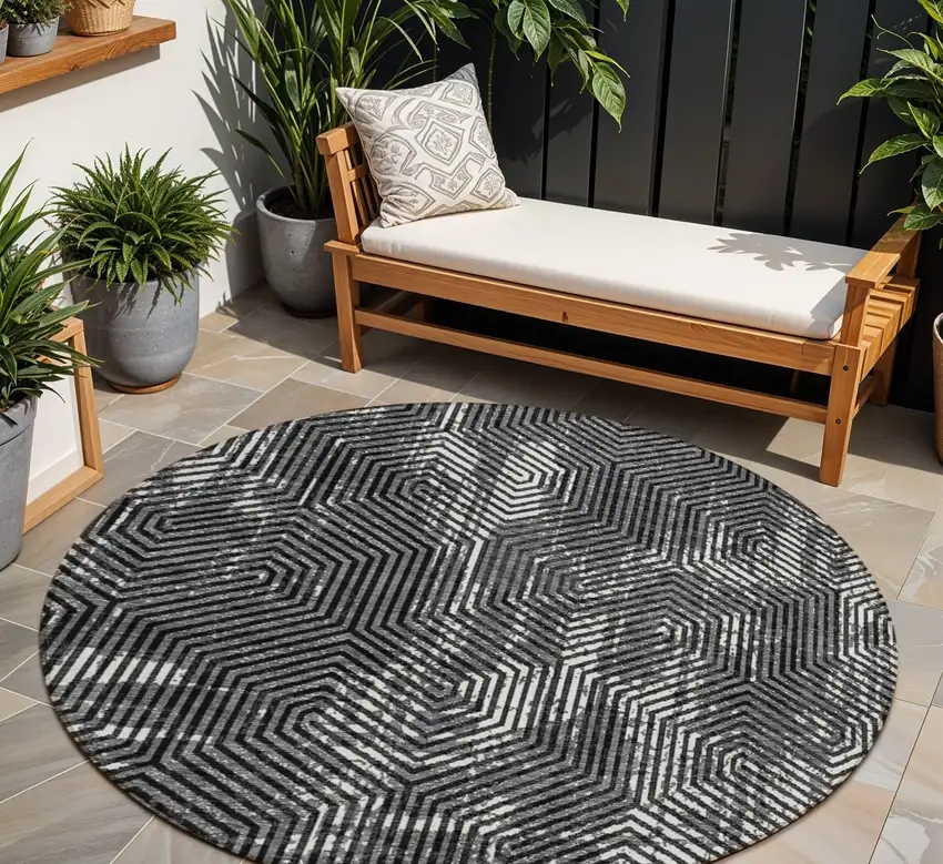 8' Black And Ivory Round Geometric Washable Indoor Outdoor Area Rug Photo 1