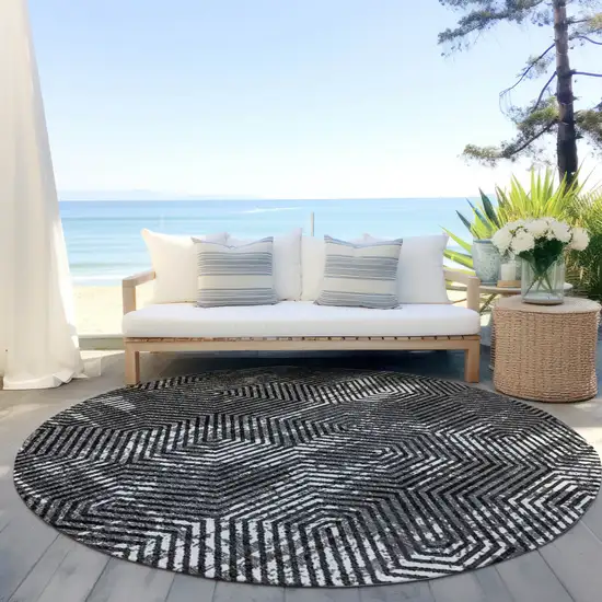 8' Black And Ivory Round Geometric Washable Indoor Outdoor Area Rug Photo 7