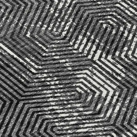 8' Black And Ivory Round Geometric Washable Indoor Outdoor Area Rug Photo 4