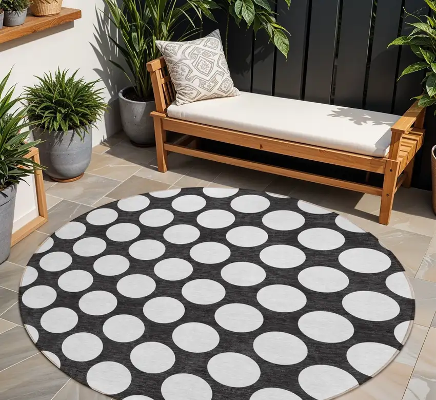 8' Black And Ivory Round Polka Dot Washable Indoor Outdoor Area Rug Photo 1